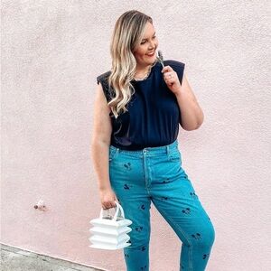 Black tee with shoulder pads